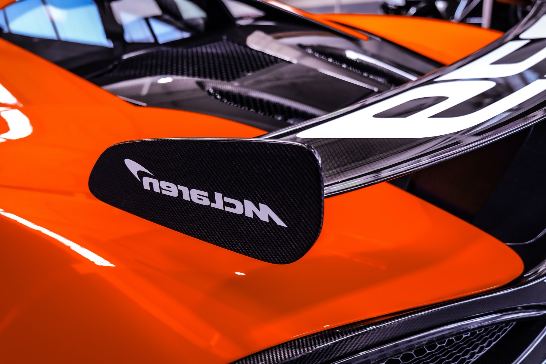 Orange bodywork and carbon-fibre rear wing detail